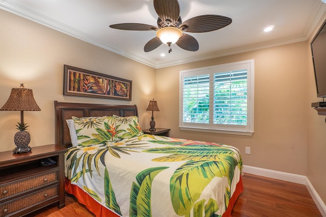 bedroom featuring ornamental molding, dark wood-type flooring, and ceiling fan