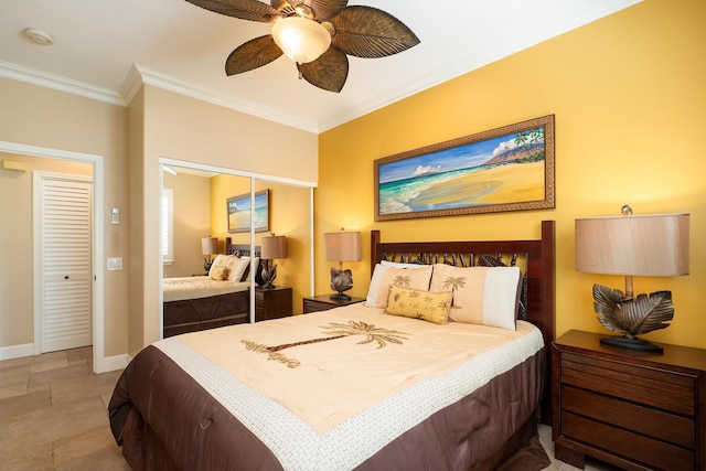 bedroom featuring a closet, ceiling fan, and crown molding