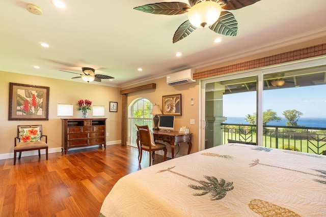 bedroom featuring access to outside, crown molding, hardwood / wood-style flooring, a wall unit AC, and ceiling fan