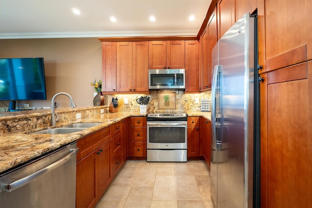 kitchen with decorative backsplash, sink, crown molding, light stone countertops, and appliances with stainless steel finishes