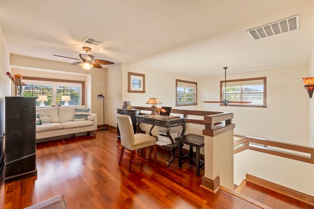 office featuring ceiling fan and dark hardwood / wood-style flooring