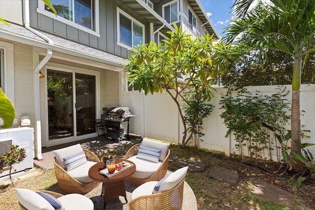 31 E Kuu Aku Ln Unit 206, Lahaina, HI 96761 - fenced backyard with a grill, a patio area, and a cooling unit