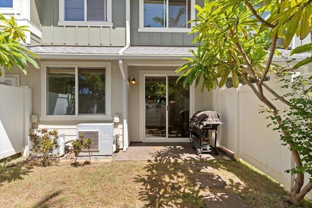 31 E Kuu Aku Ln Unit 206, Lahaina, HI 96761 - entrance to property with board and batten siding and a cooling unit