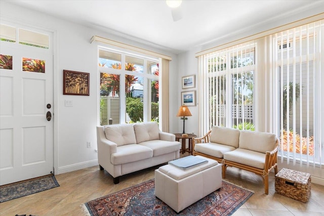 tiled living room with baseboards