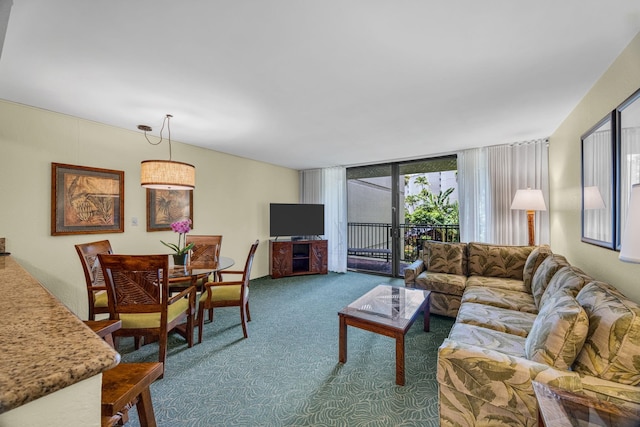living room with carpet floors and expansive windows