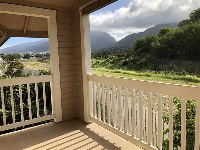 balcony featuring a mountain view