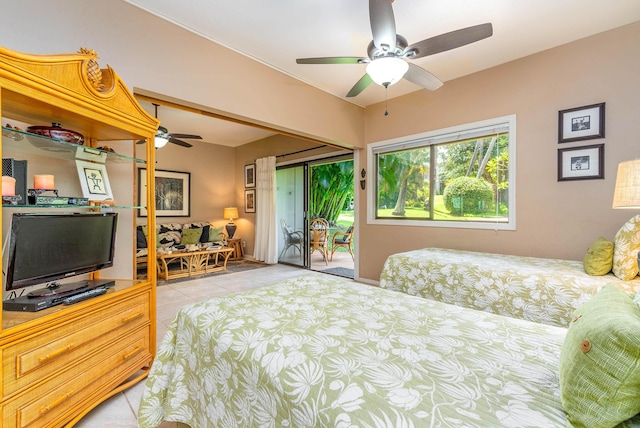 bedroom featuring light tile patterned floors, access to outside, and ceiling fan