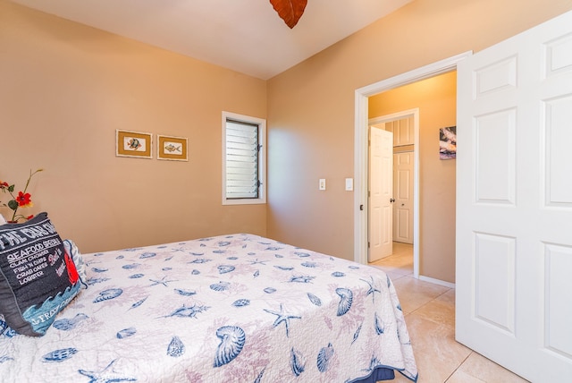 bedroom featuring light tile patterned floors