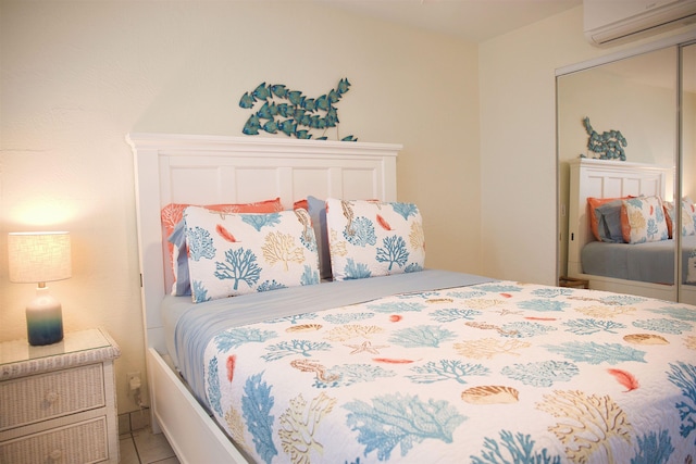 tiled bedroom with a wall mounted AC