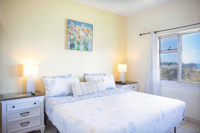 bedroom with tile patterned floors