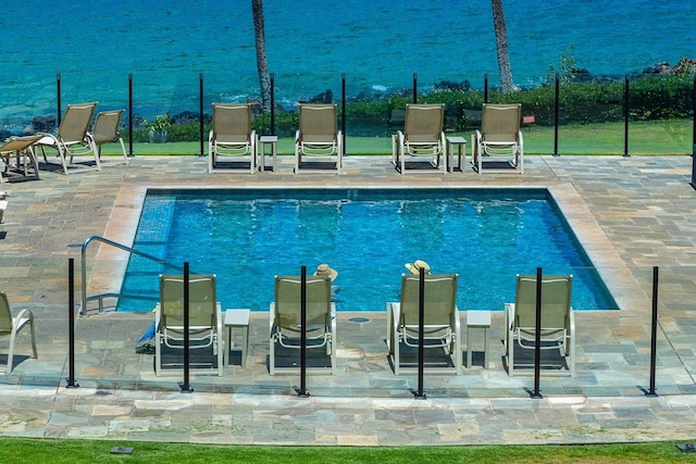 community pool with a patio