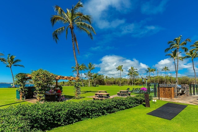 view of home's community featuring a lawn