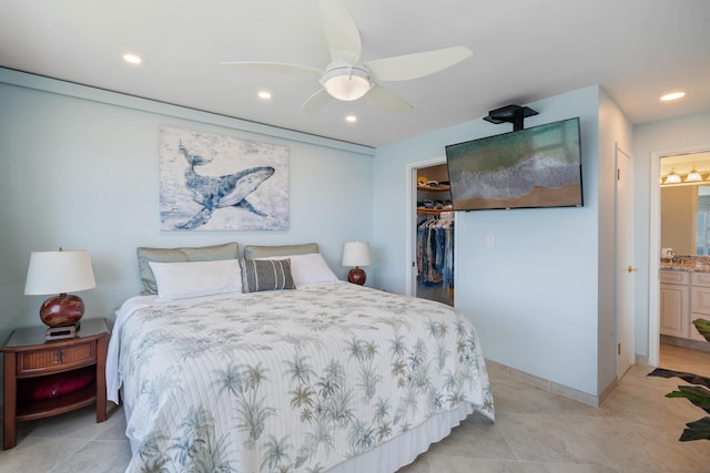 2430 S Kihei Rd Unit 411, Kihei, HI 96753 - bedroom with recessed lighting, a walk in closet, a closet, connected bathroom, and a ceiling fan