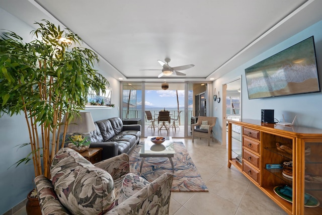 2430 S Kihei Rd Unit 411, Kihei, HI 96753 - living area with a ceiling fan and light tile patterned flooring