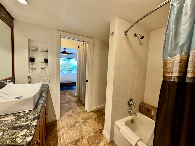 bathroom featuring ceiling fan, shower / bathtub combination with curtain, tile floors, and oversized vanity