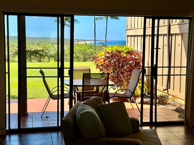 sunroom with a water view and plenty of natural light