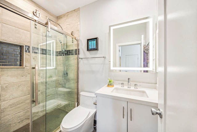 bathroom with walk in shower, vanity, and toilet