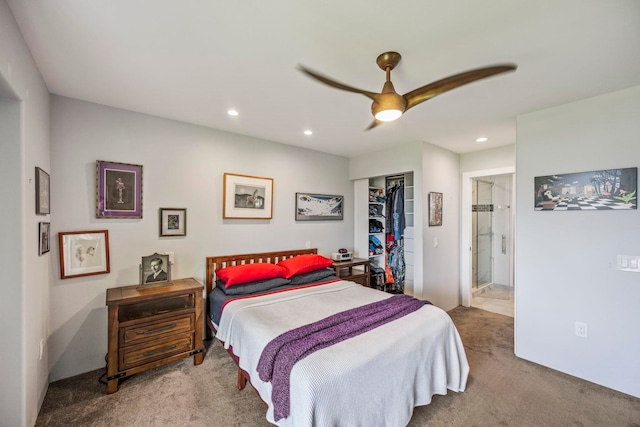 bedroom with carpet, ceiling fan, and a closet