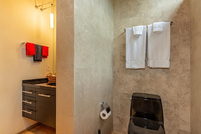 bathroom featuring tile patterned floors and vanity