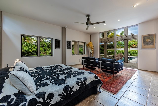 tiled bedroom featuring access to outside and ceiling fan