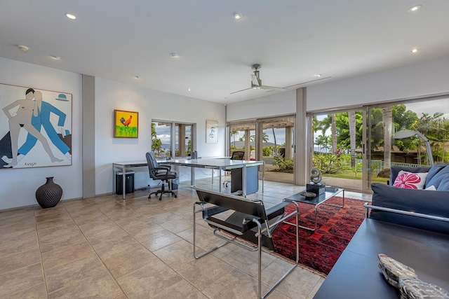 living room with ceiling fan, light tile patterned flooring, and plenty of natural light