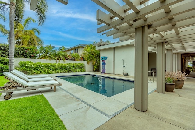 view of pool with a pergola and a patio area