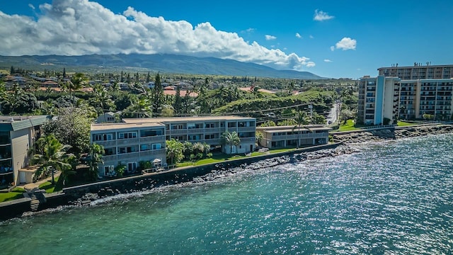 bird's eye view with a water and mountain view