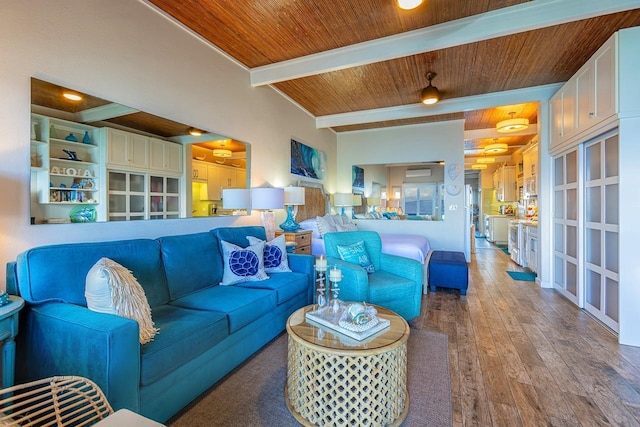 living room featuring wood ceiling, hardwood / wood-style flooring, and vaulted ceiling with beams