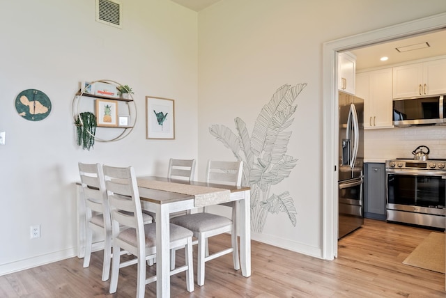 dining area featuring light hardwood / wood-style flooring