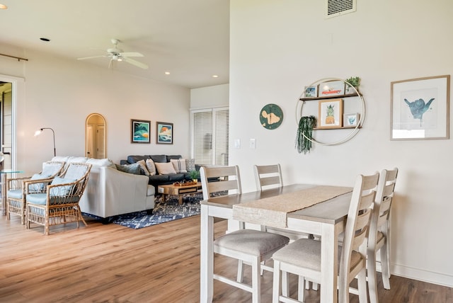 dining space featuring hardwood / wood-style floors and ceiling fan