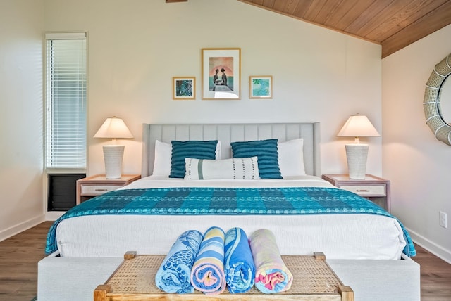 bedroom featuring lofted ceiling, wood ceiling, and hardwood / wood-style flooring