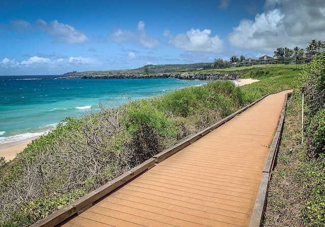 property view of water featuring a beach view