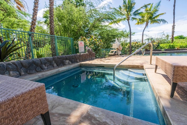 32 Hune One Ln Unit 5-203, Kihei, HI 96753 - swimming pool featuring fence and a patio