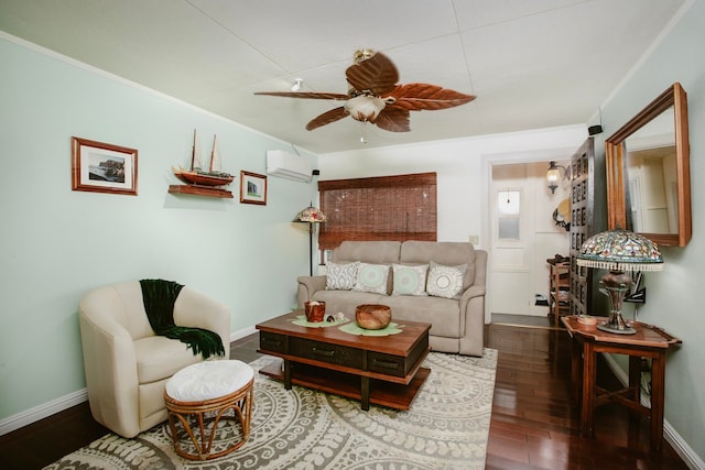 living area featuring ornamental molding, ceiling fan, wood finished floors, a wall mounted air conditioner, and baseboards