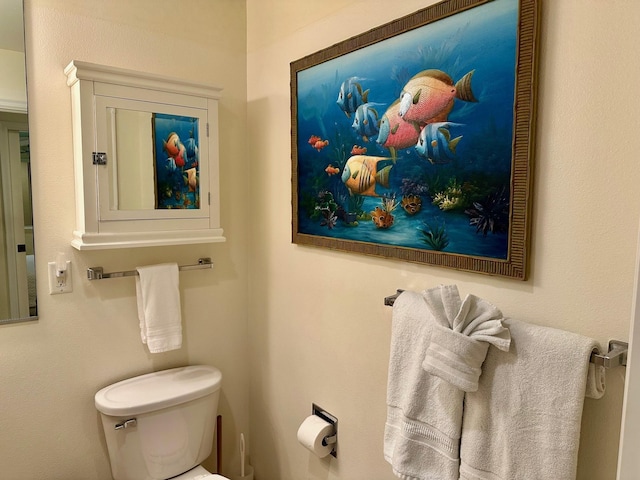 bathroom featuring toilet