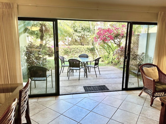 entryway featuring light tile patterned floors