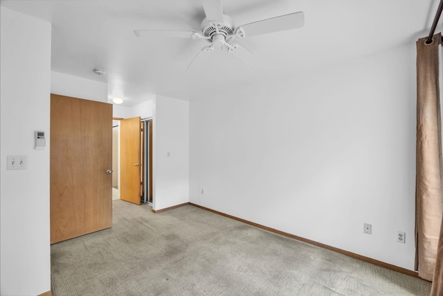 36 Kunihi Ln Unit 213, Kahului, HI 96732 - carpeted spare room featuring baseboards and ceiling fan