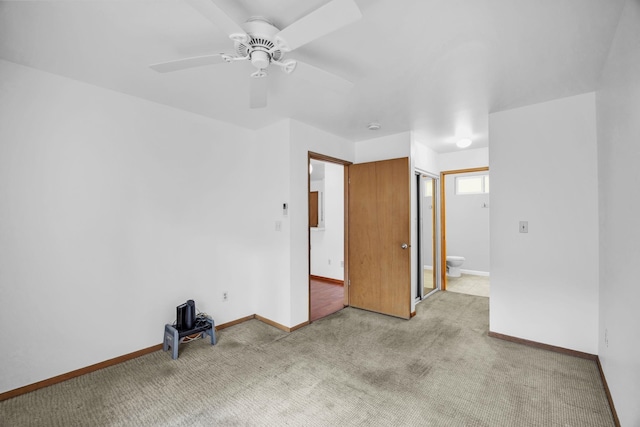 36 Kunihi Ln Unit 213, Kahului, HI 96732 - unfurnished room featuring ceiling fan, carpet floors, and baseboards