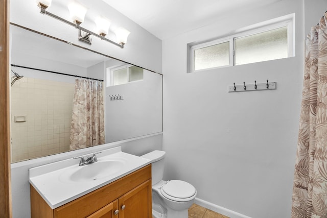 36 Kunihi Ln Unit 213, Kahului, HI 96732 - bathroom with tile patterned floors, vanity, toilet, and a shower with shower curtain