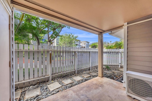 36 Kunihi Ln Unit 213, Kahului, HI 96732 - view of patio / terrace with ac unit and fence