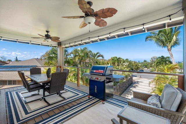 sunroom / solarium with ceiling fan