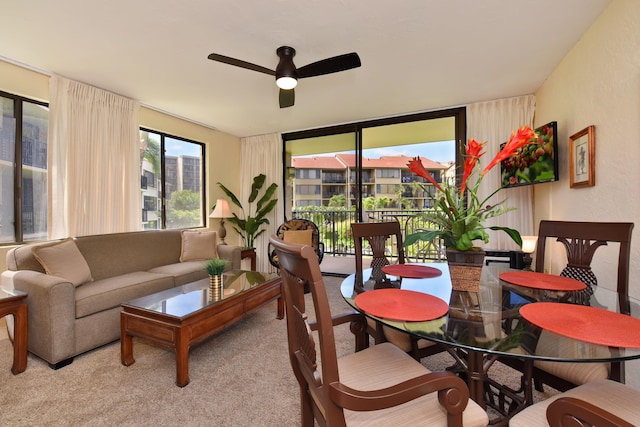 interior space with ceiling fan