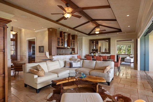 living room featuring coffered ceiling, light tile flooring, ceiling fan, and beamed ceiling