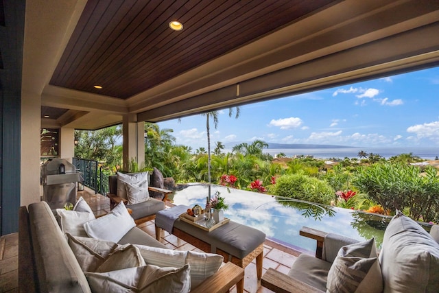 view of patio / terrace with an outdoor hangout area, a balcony, and grilling area