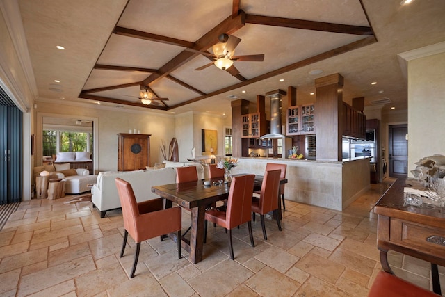 tiled dining area featuring coffered ceiling, beam ceiling, crown molding, and ceiling fan