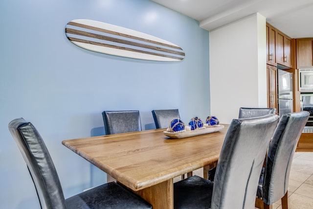 3200 Wailea Alanui Dr Unit 2105, Kihei, HI 96753 - dining space featuring light tile patterned floors