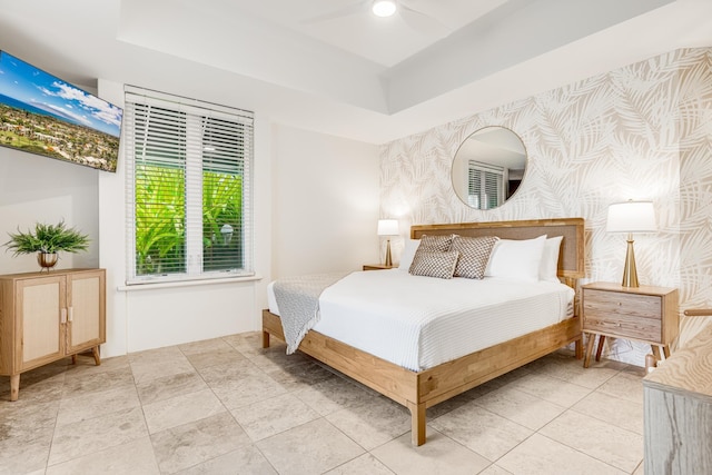 3200 Wailea Alanui Dr Unit 2105, Kihei, HI 96753 - bedroom featuring wallpapered walls and a tray ceiling