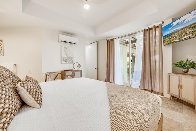 3200 Wailea Alanui Dr Unit 2105, Kihei, HI 96753 - bedroom with a wall unit AC, access to exterior, a raised ceiling, and a ceiling fan