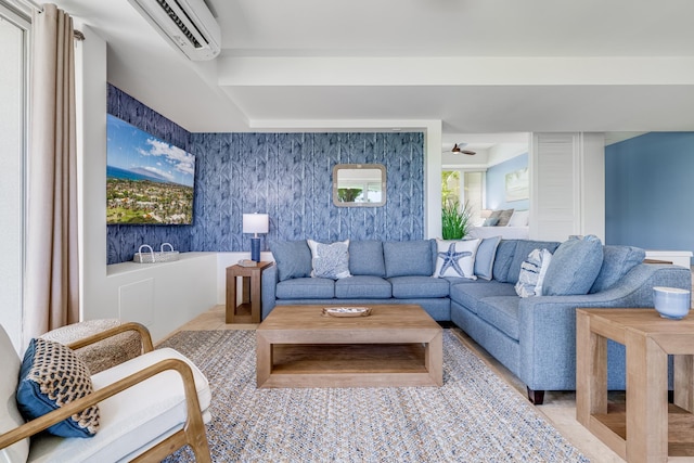 3200 Wailea Alanui Dr Unit 2105, Kihei, HI 96753 - living room featuring a wall unit AC and a ceiling fan