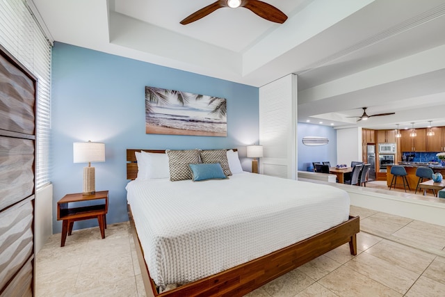 3200 Wailea Alanui Dr Unit 2105, Kihei, HI 96753 - bedroom featuring a tray ceiling and light tile patterned flooring
